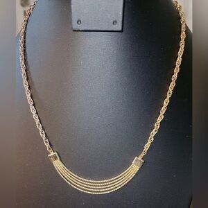 Golden necklace with multiple strands